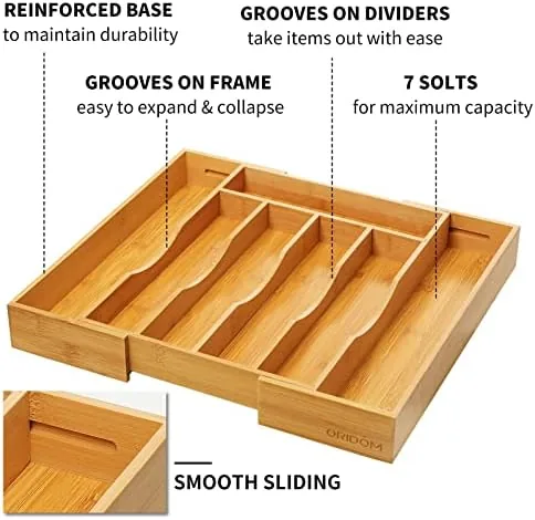 The bamboo organizer next to a fixed plastic cutlery tray