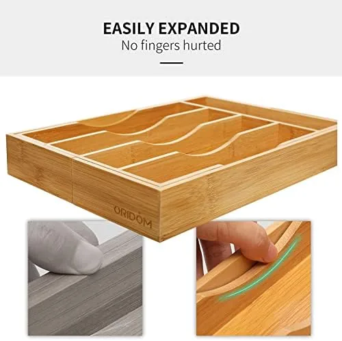 The bamboo organizer in a fully organized kitchen drawer