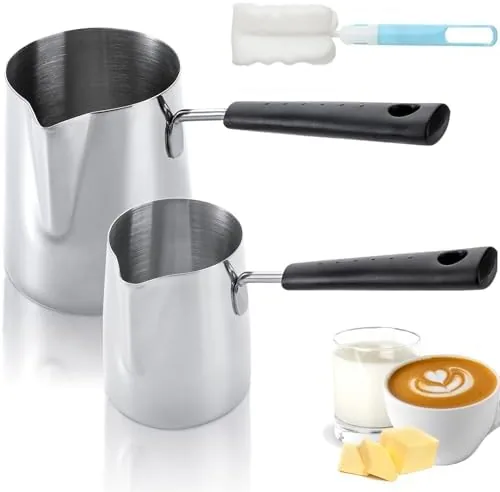 Two Dicunoy stainless steel warmer pots with long handles on a stovetop