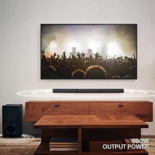Subwoofer and rear speakers arranged in a media room