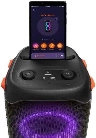 The top control panel of the JBL PartyBox 110 with its buttons and input door