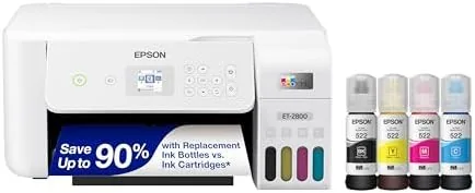 The white Epson EcoTank ET-2800 on a kitchen counter next to a laptop