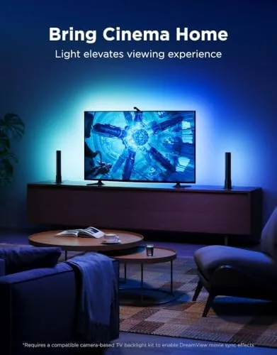 A movie scene with the light bars providing warm bias lighting behind the TV