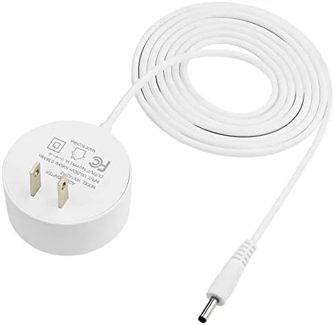 The adapter connector shown next to a Google Nest Mini on a shelf