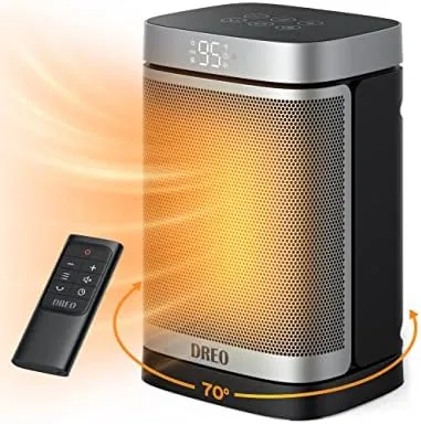 The DREO space heater standing in the corner of a bedroom