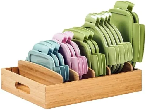 Bamboo lid organizer in a cabinet holding round and square lids upright