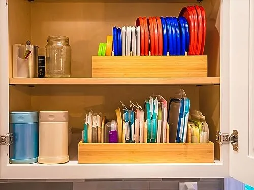 Bamboo caddy beside a plastic stackable lid rack