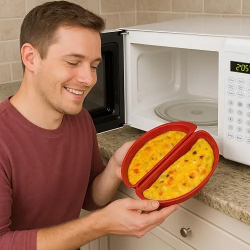 Scrambled eggs cooking in the microwave egg cooker base bowl with the lid removed
