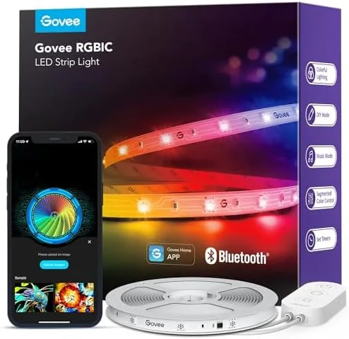Govee RGBIC LED strip lights glowing in multiple colors along a bedroom wall