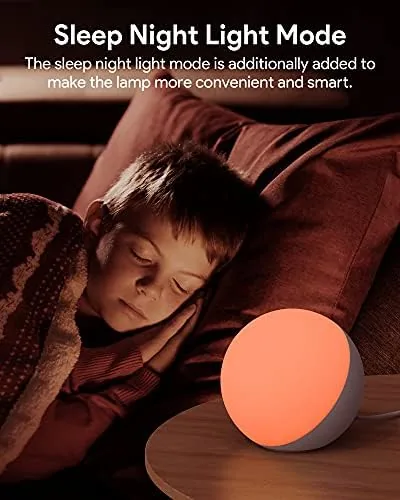 The smart lamp next to a standard desk lamp with a smart bulb