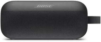 Bose SoundLink Flex speaker upright beside a pool lounger