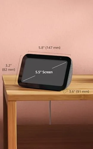 Echo Show 5 on a desk showing a focus timer and alarm