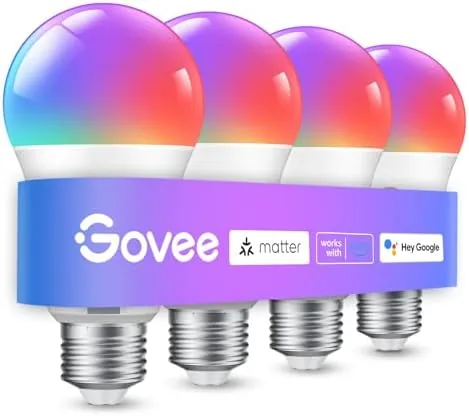 Four Govee WiFi color light bulbs in a row on a kitchen counter