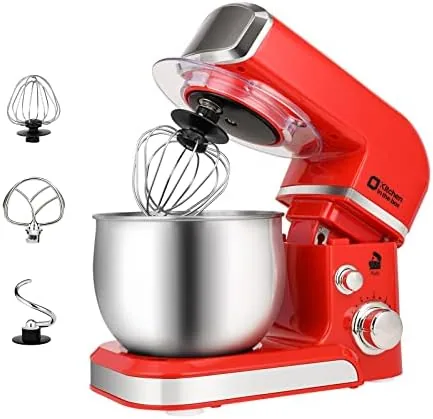 Red 3.2 quart stand mixer on a kitchen counter with attachments laid out