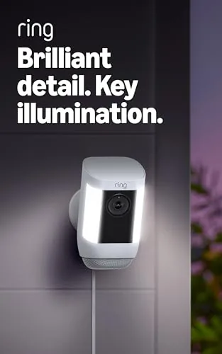 Ring Spotlight Cam Pro mounted under a driveway eave