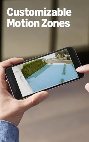 Homeowner reviewing a Ring Spotlight Cam Pro motion event on a phone