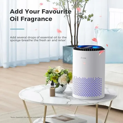 AROEVE MK01A air purifier placed on a dresser next to a plant