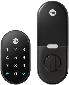 The Nest x Yale Lock mounted on a front door in Black Suede finish