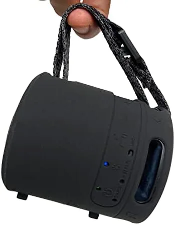 The speaker held one handed with the cover showing the improved grip