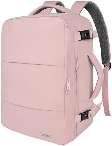 The Taygeer travel backpack in pink standing on an airport concourse