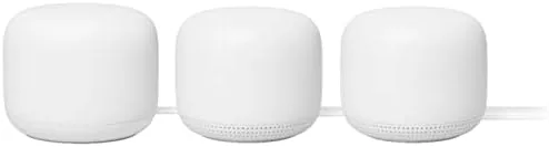 The Google Nest WiFi router and two access points arranged on a shelf in the Snow color