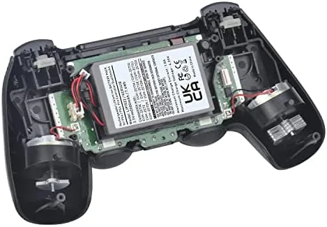 Open DualShock 4 showing the installed Batmax battery