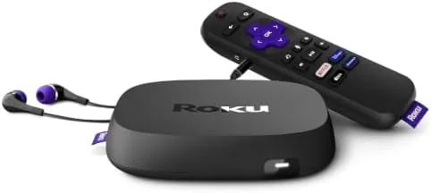 The Roku Ultra LT box with the remote and headphones laid out beside it