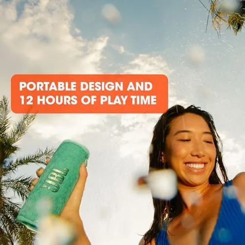 The JBL Flip 6 by a pool during testing