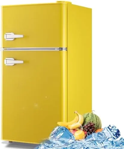 Yellow retro mini fridge in a small apartment kitchen