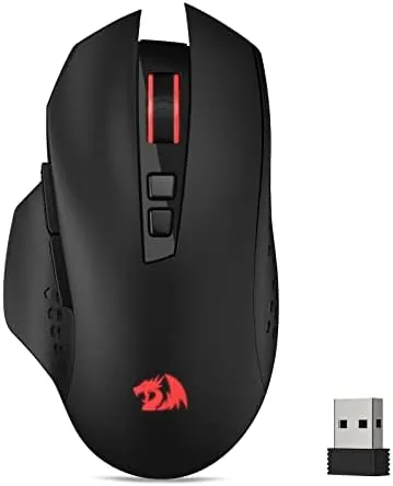 Redragon M656 wireless gaming mouse on a desk with its charging cable