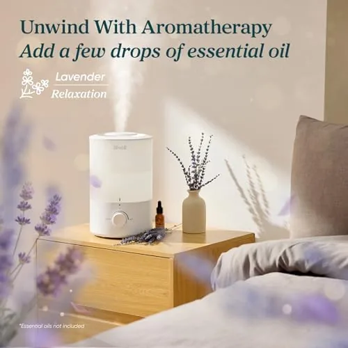 Mist rising from the 360 degree nozzle of the Levoit humidifier