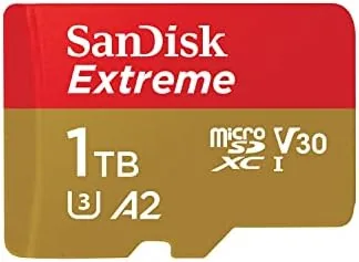 SANDISK 1TB Extreme microSD card beside its full-size SD adapter