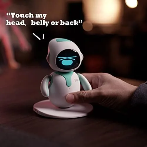Close up of a hand touching the Eilik robot head while it reacts