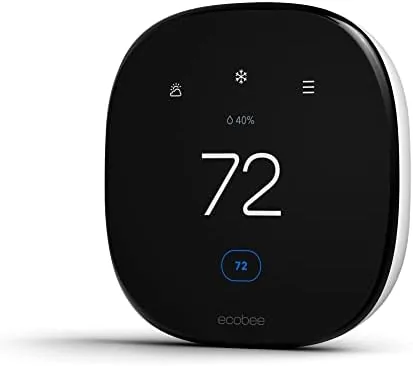 The ecobee Smart Thermostat Enhanced mounted on a hallway wall