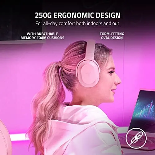 A person wearing the Razer Barracuda X Quartz Pink while gaming