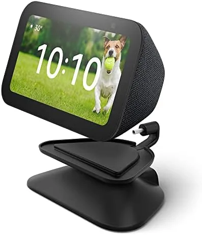 Echo Show 5 sitting upright in the adjustable charcoal stand on a nightstand