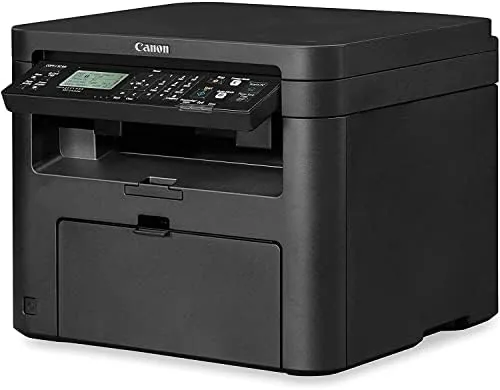 Freshly printed documents in the output tray showing clean black text