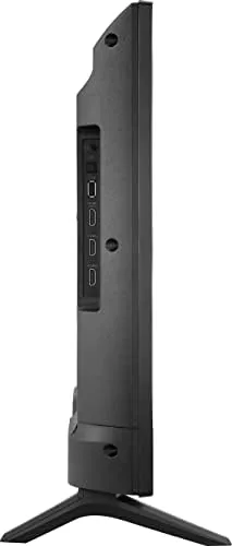 The Alexa voice remote held in a hand with the voice button highlighted