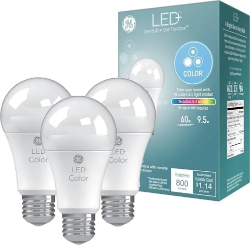 GE LED+ color changing bulbs glowing in a three-light lamp in a living room