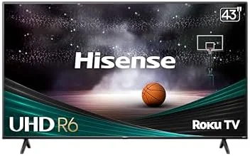 Hisense 43R6G 4K Roku TV on a media stand in a living room showing a colorful nature scene
