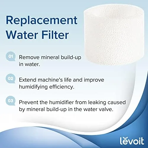 A Levoit filter being inserted into the top of a top fill humidifier tank