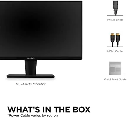 A home office desk with the ViewSonic VS2447M as the primary monitor