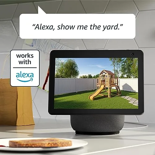 A front door and driveway both covered by the two Blink Outdoor 4 cameras