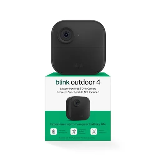 A Blink Outdoor 4 add-on camera mounted on a fence overlooking a backyard