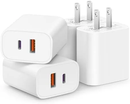 Four compact white 20W chargers arranged together on a desk