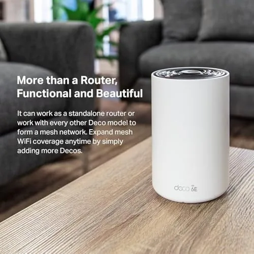 Deco XE75 node placed centrally in a living room shelf setup