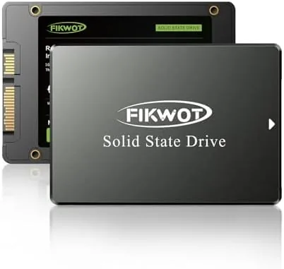 The black Fikwot FS810 128GB SSD sitting on a desk with its drive casing visible