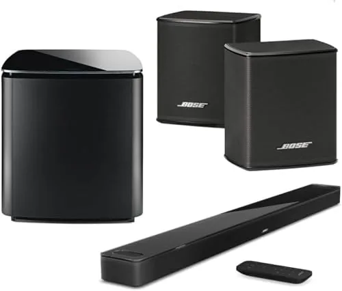 The Bose Smart Ultra soundbar sitting beneath a television with the Bass Module 700