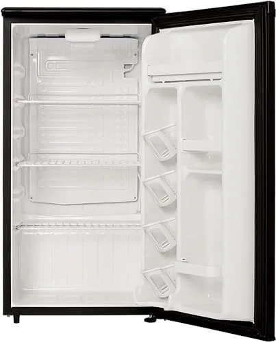 The E-Star 3.3 cu ft mini fridge sitting in a home office corner