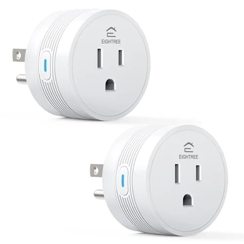 Two EIGHTREE smart plugs packaged as a pair on a desk